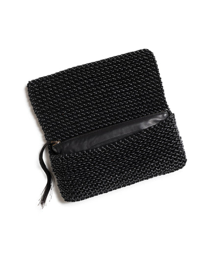 THE SIGNATURE CLUTCH