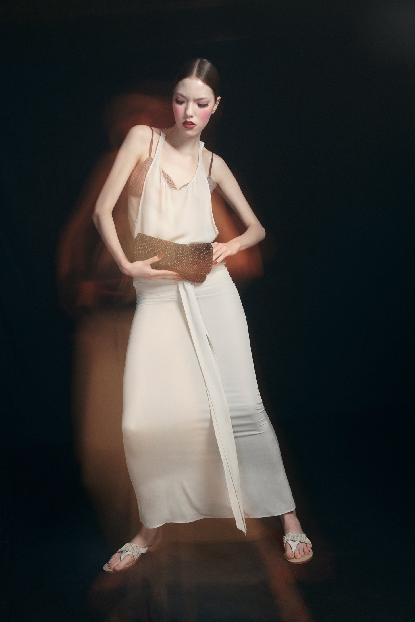 THE SIGNATURE CLUTCH